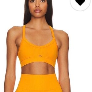 REVOLVE ALALA Barre Cami Sports Bra in Tangerine Large